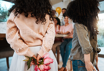 Buy stock photo Flowers, back surprise and family at a birthday celebration with children and hiding a gift together. Love, mothers day or kids giving a floral present at a home party for parents or grandparents