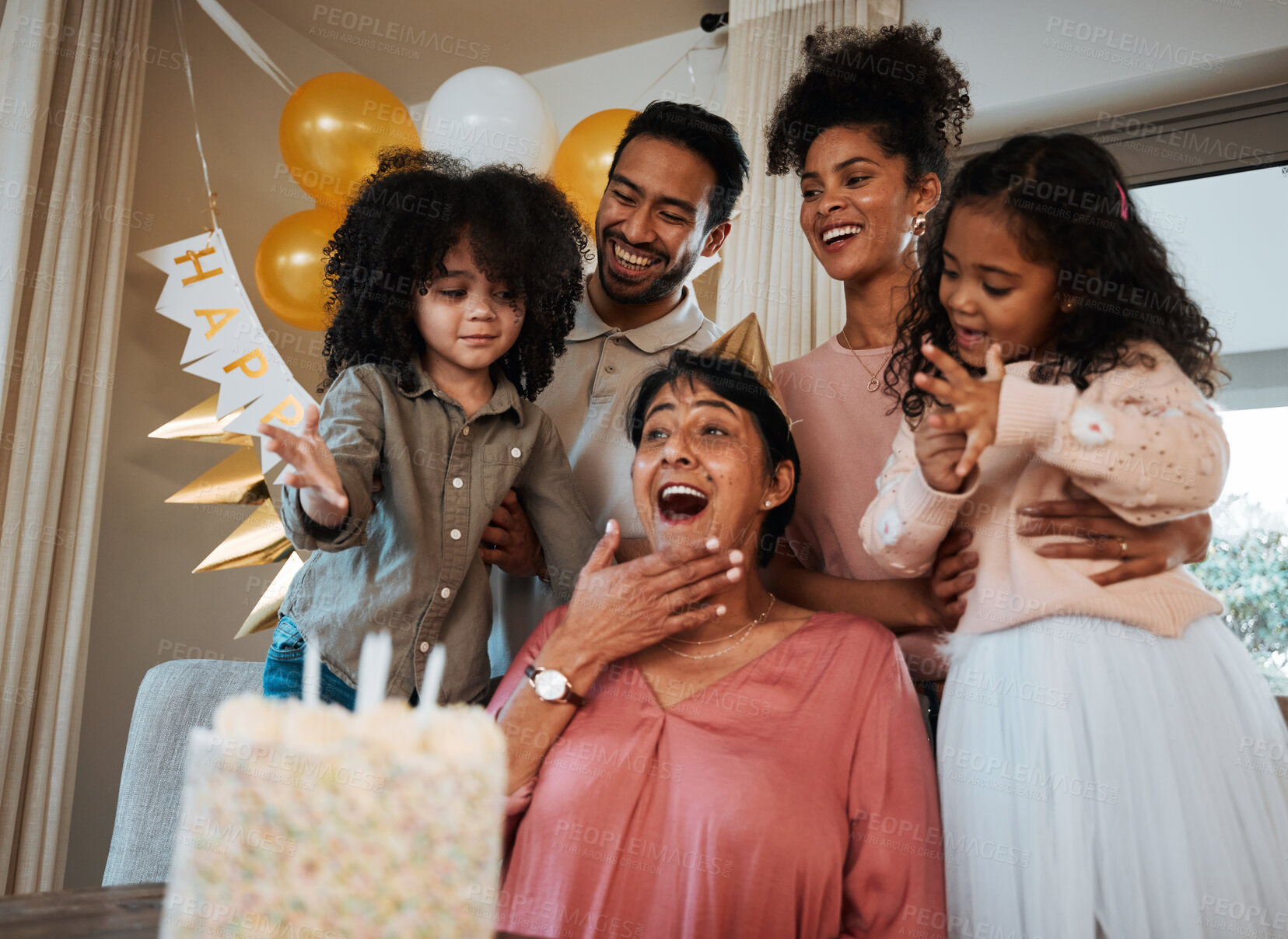 Buy stock photo Birthday, surprise and children with grandmother with cake for event, party celebration and social gathering. Happy family, celebrate and excited grandma with parents and kids for dessert at home