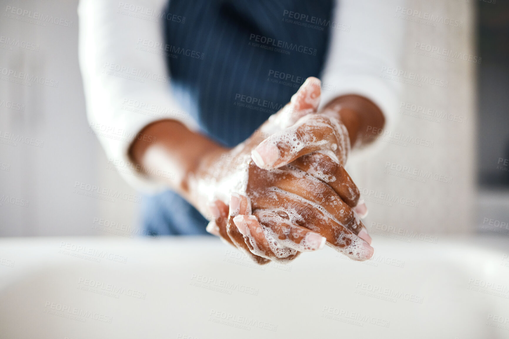 Buy stock photo Hands, cleaning and soap with hygiene in bathroom, safety from bacteria and germs, disinfection and skincare. Health, wellness and person at home, sanitizer foam to clean and healthy with handwashing