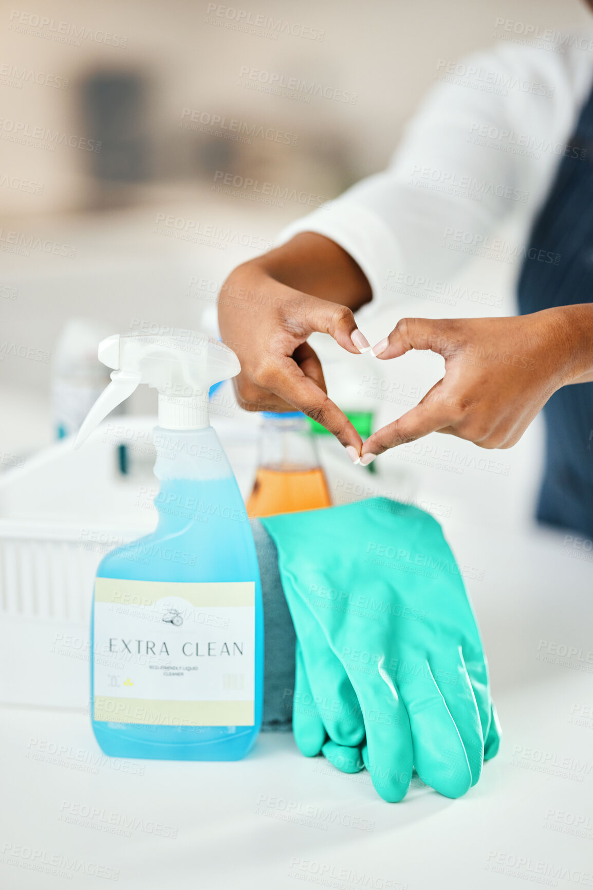 Buy stock photo Heart hands, cleaner and chemical detergent bottle, cleaning kitchen and closeup of supplies for hygiene. Care, support and health with disinfectant spray, housekeeping and person with tools to clean