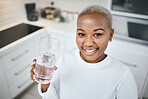 Portrait, glass or black woman drinking water, kitchen or health with nutrition, happiness or wellness. Face, female person or girl with liquid for energy, home or detox with peace, calm or apartment