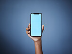 Phone, mockup and woman hand in studio with space for plan, menu or information, contact or space on dark background. Blue screen, smartphone and person show text, product placement or social media 