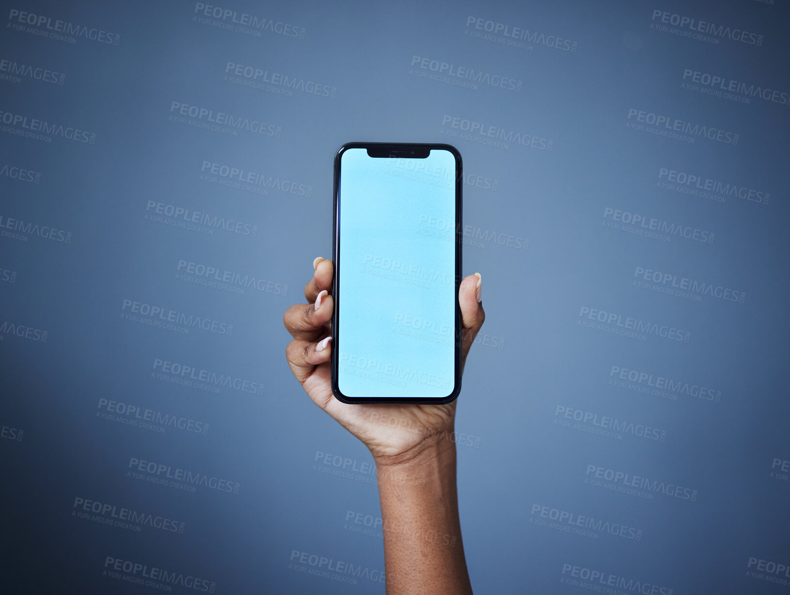 Buy stock photo Phone, mockup and woman hand in studio with space for plan, menu or information, contact or space on dark background. Blue screen, smartphone and person show text, product placement or social media 