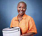 African woman, gift box and studio portrait with excited smile, birthday and blue background. African girl, happy and deal with present, package and fashion for celebration, winner and birthday party