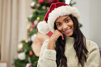 Buy stock photo Happy woman, portrait and Christmas hat for festive season, celebration or gift giving time at home. Face of female person with smile in relax for holiday, weekend or December party by tree in house