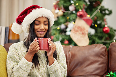 Buy stock photo Happy woman, Christmas and coffee on home sofa with a smile while thinking of memory. Face of Indian female person with a hot chocolate or tea cup to relax for festive holiday, season or celebration