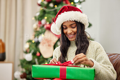 Woman, Christmas and open present with smile, celebrate holiday with happiness and wrapped box with ribbon. Special event, female person at home with gift giving and package, festive and xmas