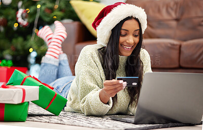 Buy stock photo Christmas, online shopping and woman with laptop, credit card for payment for gift with internet banking. Female customer, smile for holiday donation and ecommerce for present, fintech and bank app 