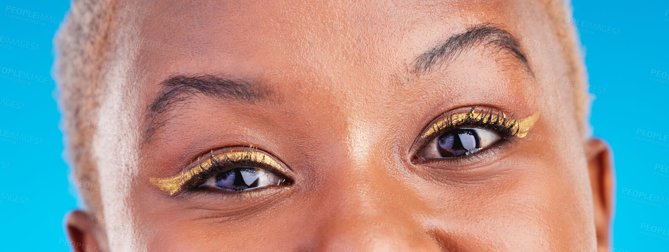 Buy stock photo Makeup portrait, eyeliner and eyes of black woman with studio beauty, wellness and facial cosmetics for skincare shine. Mascara, cosmetology design and closeup African person on blue background.