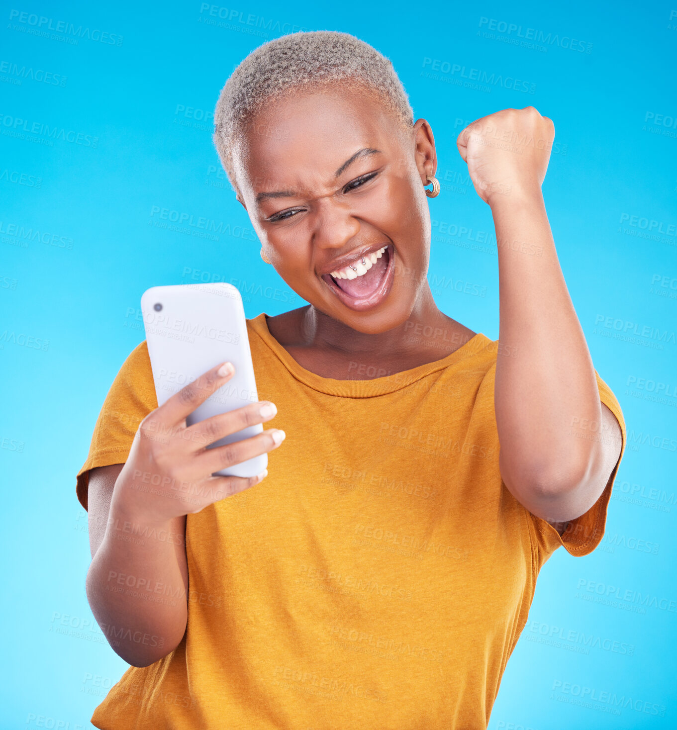 Buy stock photo Surprise, phone and happy black woman excited for announcement, winner notification or good news, alert or promo. Winning, cellphone info and studio person shocked, cheers or wow on blue background