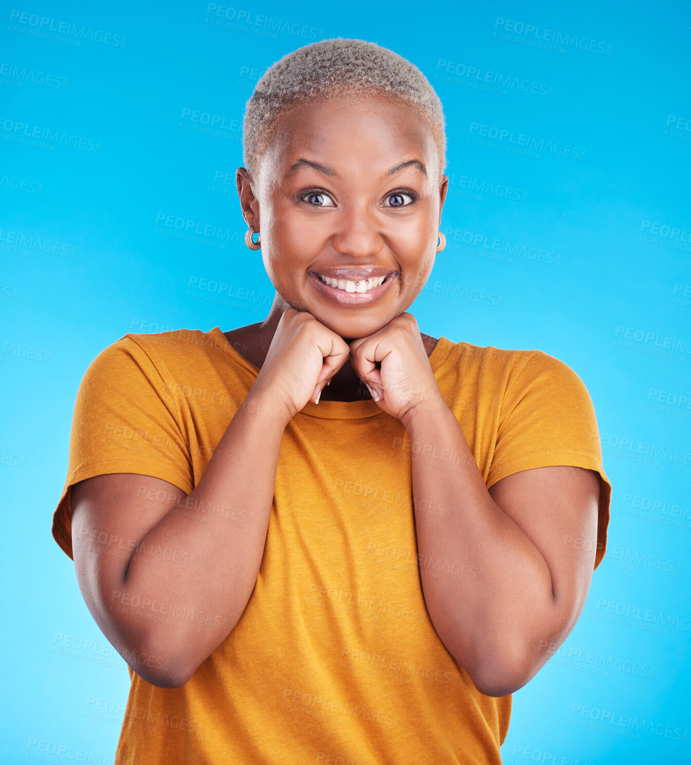 Buy stock photo Portrait, smile and black woman with hand on face with confidence in blue studio background. Beauty, cosmetic and girl with fashion or positive mindset for wellness or happiness and excited face.