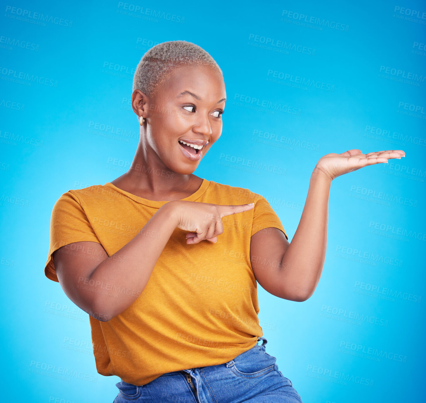 Buy stock photo Decision, choice and black woman showing, presentation and information against a blue studio background. Discount deal, female person and excited model with options, advertising and product placement