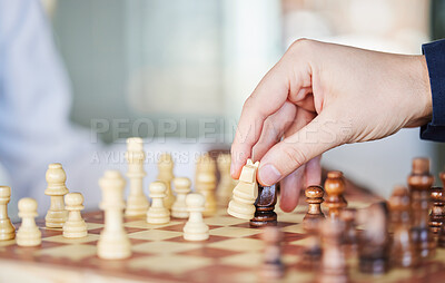 Buy stock photo Playing, board game and chess checkmate with a man at a table while moving piece for strategy or challenge. Hands of a male person to play, relax and bond while moving icon for problem solving or win