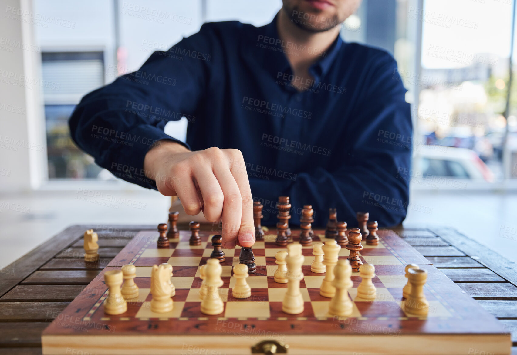 Buy stock photo Chess, man moving a knight and game of strategy, problem solving or person playing on chessboard in competition. Planning, choice and hand on piece or king, queen and player thinking of winning move