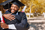 University graduation, black man and friends hug for success of college achievement, winning or support outdoor. Excited male students, smile and embrace to celebrate graduate dream, award and goals