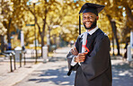 Graduation portrait, diploma and man or student on university, education or college campus and scholarship success. African person or happy graduate arms crossed with certificate or award in park