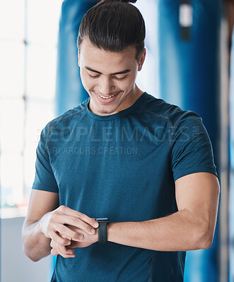 Buy stock photo Man, fitness and smart watch with app to check, measure or time exercise for tracking health on technology. Sports, athlete and happy with workout, training and cardio wellness in gym facility