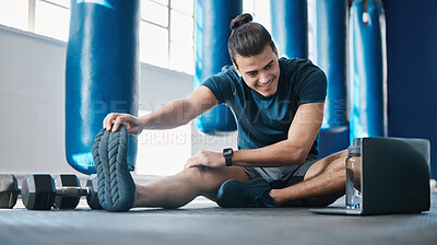Buy stock photo Stretching, fitness and a man with a laptop for exercise tutorial, information or a cardio video. Happy, gym and a male athlete with an online warm up on a computer before training and a workout