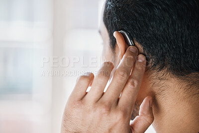 Buy stock photo Hearing aid, face and ear of man with disability from the back on mockup space. Closeup of deaf person, medical device or implant of sound waves, audiology or help of listening equipment for wellness