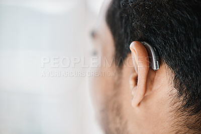 Buy stock photo Hearing aid, closeup or ear of man with disability from the back on mockup space. Deaf person, medical device or implant of sound waves, audiology or help of listening equipment, accessory or support