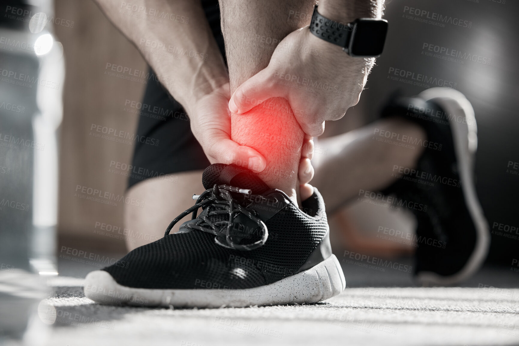 Buy stock photo Hand, ankle pain and injury with the leg of a man in red highlight during a fitness workout. Healthcare, medical and emergency with a male runner holding a joint after a cardio accident in the gym