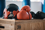 Gym, equipment and helmet with gloves for boxing fitness, commitment and inspiration in sports training. Kickboxing tools, safety and security in fight exercise, competition goals and fit motivation.