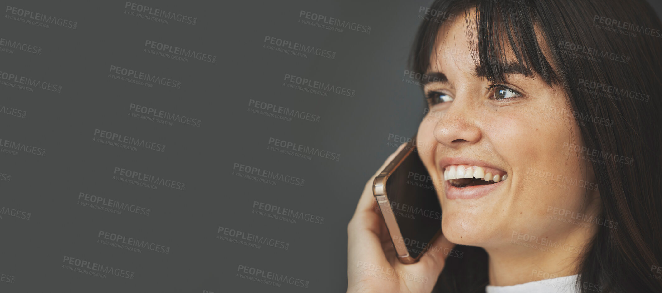 Buy stock photo Happy woman, face and phone call on mockup space for communication, networking or social media. Female person smile talking on mobile smartphone in banner advertising against a grey studio background