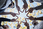 Creative people, hands and star in teamwork, solidarity or collaboration for unity in nature. Low angle of team group touching fingers together for faith, support or community, hope or startup goals