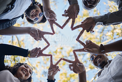 Buy stock photo Creative people, hands and star with fingers in teamwork, solidarity or collaboration in nature. Low angle of team group touching hand together for faith, support or community, hope or startup goals