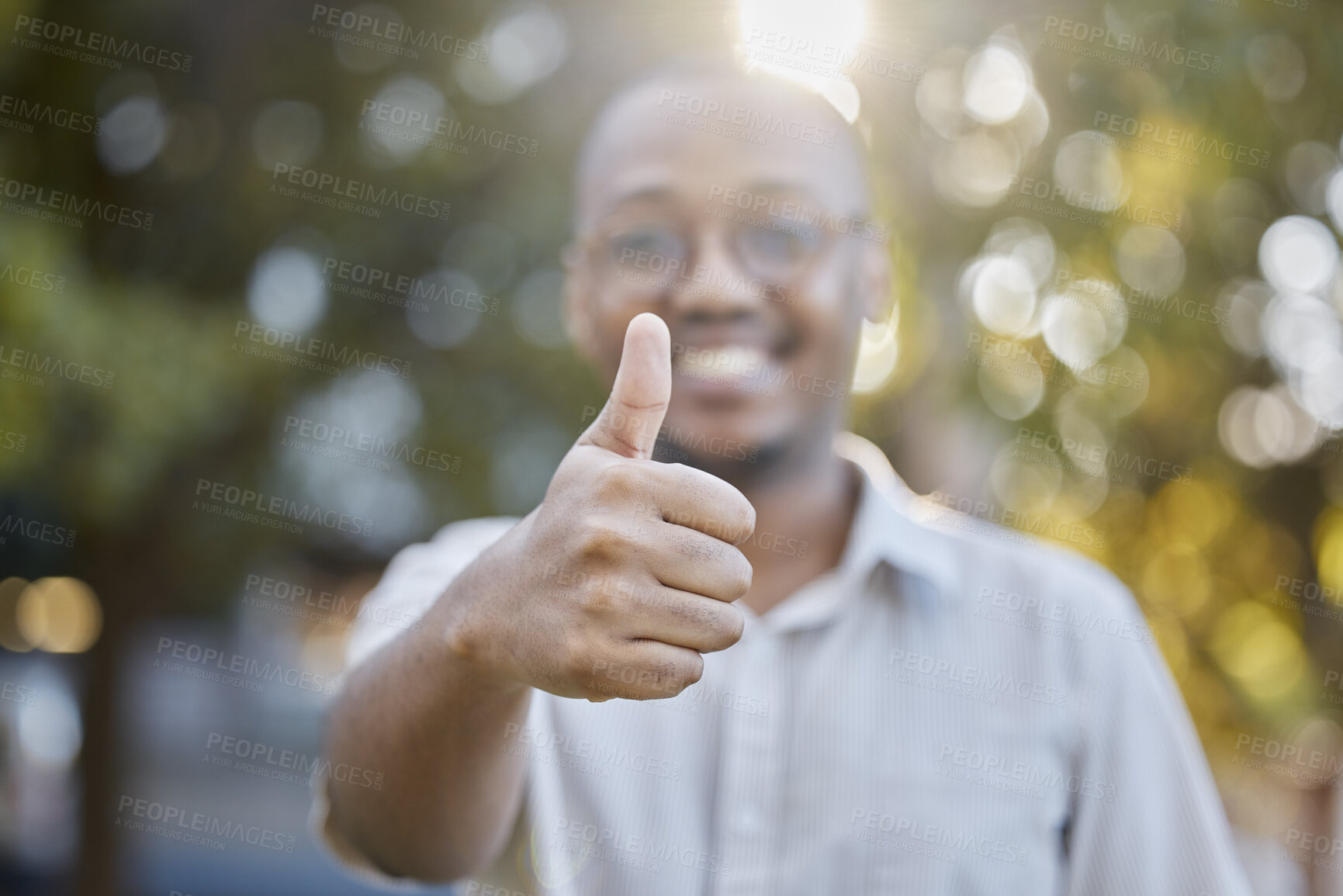 Buy stock photo Black man, hands and thumbs up in park for success, good job or approval in the nature outdoors. Portrait of happy African male person show thumb emoji, yes sign or like for agreement or deal outside