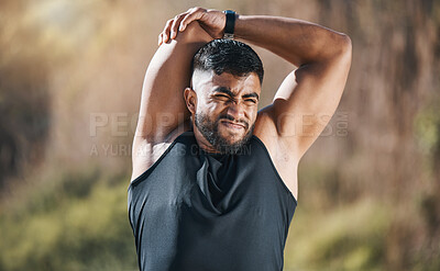 Buy stock photo Fitness, stretching and man outdoor for training, running or workout on blurred background. Arm, stretch and Indian guy runner with body warm up in nature before exercise, run or cardio sport routine
