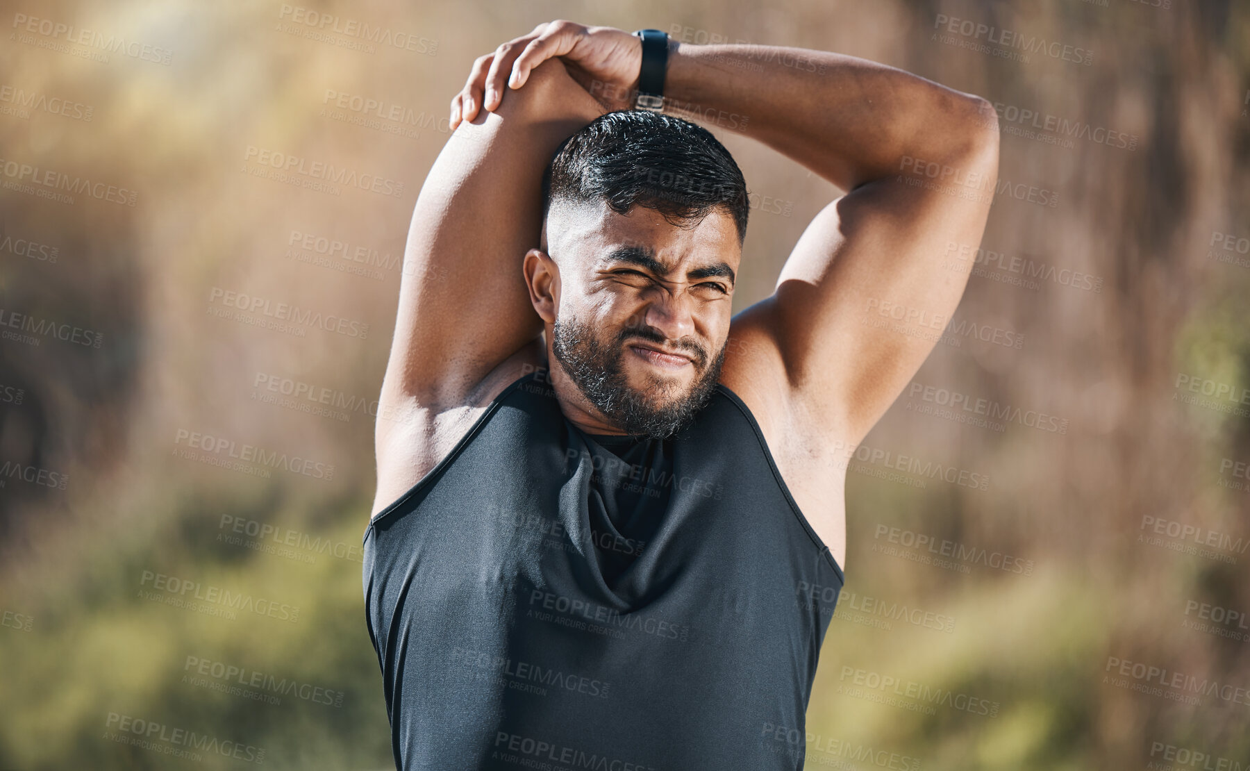 Buy stock photo Fitness, stretching and man outdoor for training, running or workout on blurred background. Arm, stretch and Indian guy runner with body warm up in nature before exercise, run or cardio sport routine