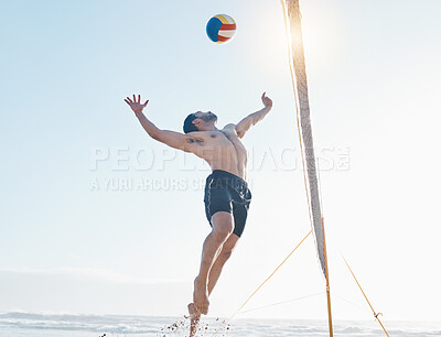 Buy stock photo Beach, exercise and man with fitness, volleyball and fun with sunshine, moving and healthy. Male person, athlete and player with seaside sports, game with speed or workout goals with sand or wellness