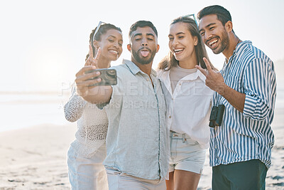 Buy stock photo Happy friends, selfie and beach for memory, photo or picture in goofy or silly fun together in nature. Group of people with smile and peace sign on ocean coast for vlog, online post or social media