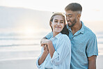 Couple, hug on beach and love, travel and holiday with mockup space and happiness together outdoor. Summer, support and care with affection, man and woman in nature with adventure by the ocean