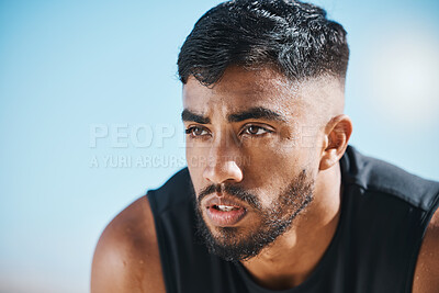 Buy stock photo Fitness, break and tired man outdoor breathing, rest and relax after training, workout or running. Face, breathe and Indian male runner stop to recover from exercise, challenge or sports performance