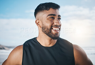 Buy stock photo Thinking, fitness and face of man on beach ready for exercise, marathon training and cardio workout. Sports, nature and happy Indian male person outdoors for wellness, warm up and running by ocean