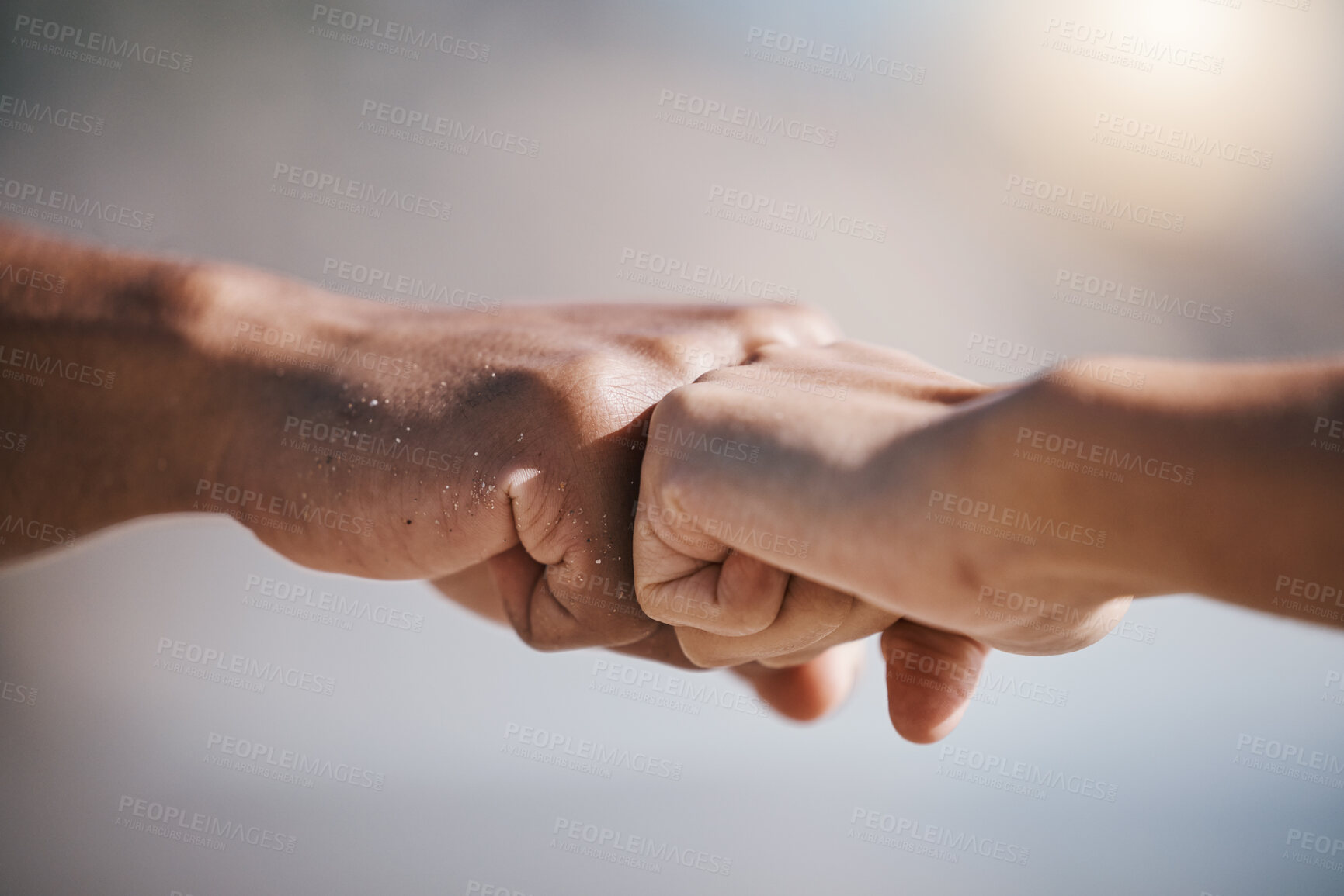 Buy stock photo Man, hands and fist bump for teamwork, partnership or unity in solidarity or community in the outdoors. Hand of friends bumping fists together for team goals, support or motivation in collaboration