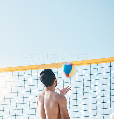 Buy stock photo Sports, beach or man with volleyball on blue sky for exercise, fun competition or contest with mockup space. Back of male person throw to serve ball at sea for fitness, outdoor summer games or action