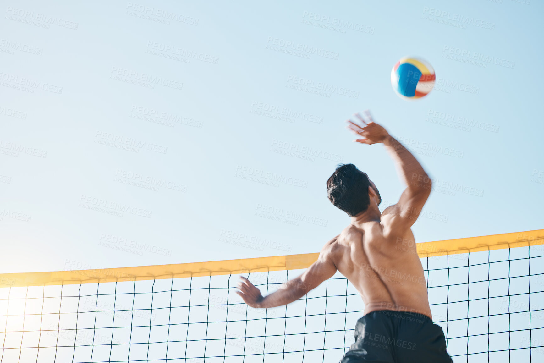 Buy stock photo Volleyball, man and spiking, net with sports and fitness outdoor, playing game with blue sky and summer. Exercise, male athlete and match with ball and active, workout and action with tournament