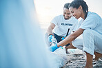 Volunteer, mockup and people cleaning beach for world earth day, care and kindness for natural environment. Help, recycle and happy man and woman picking up plastic waste and pollution on ocean sand.