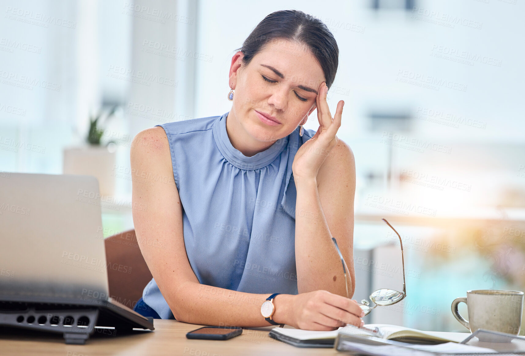 Buy stock photo Pain, headache and glasses of business woman on laptop editing report, online research or job problem at office. Stress, fatigue and tired editor, journalist or professional person on her computer