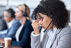 Headache, tired or woman in call center with burnout, head pain or overworked in crm communication. Migraine, office or stressed telemarketing sales agent frustrated with anxiety, fatigue or problem 