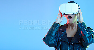 Buy stock photo VR, glasses and woman, wow or surprise on studio, blue background for cyberpunk, gaming and streaming 3d video. High tech, virtual reality and excited gen z person with grunge fashion and mockup
