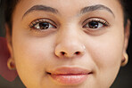 Closeup, woman and portrait of face with smile for vision, career ambition or natural beauty. Happy female person or model looking in determination and motivation for facial recognition or identity