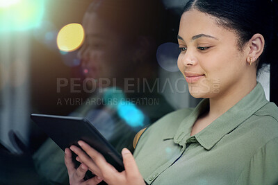 Buy stock photo Digital tablet, city and businesswoman doing research for a corporate project on a rooftop. Technology, online and professional female employee working on company report in an urban town at night. 
