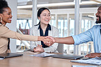 Business people, man and woman with handshake in meeting for onboarding, deal or happy for teamwork. Shaking hands, team and diversity at hiring, solidarity or congratulations for achievement at job