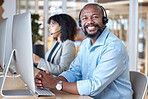 Call center, portrait of black man and smile at computer for customer service, business support and contact us in CRM office. Happy telemarketing agent at desktop for consulting in coworking agency