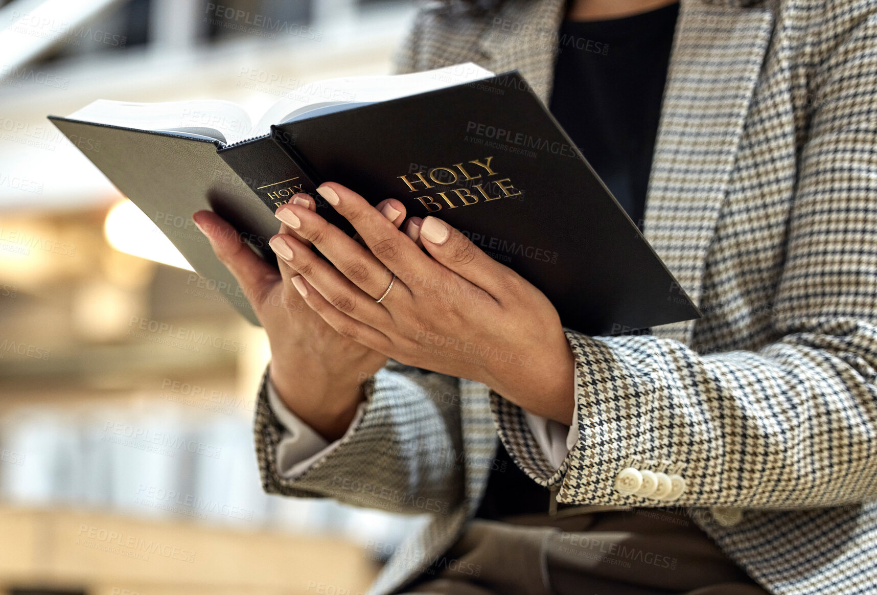 Buy stock photo Hands, bible and person with reading, religion and faith with knowledge, learning and studying God. Priest, book and focus for spiritual wisdom, information and mindset for Christianity with peace