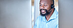 Call center, black man and communication at computer for customer service, CRM and contact us on mockup space. Banner, face and happy male agent at desktop pc for telemarketing, consulting or support